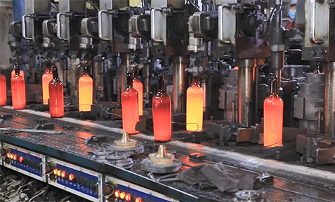 Glass bottle molding production